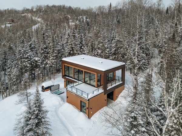 Aerial view of the snowy property